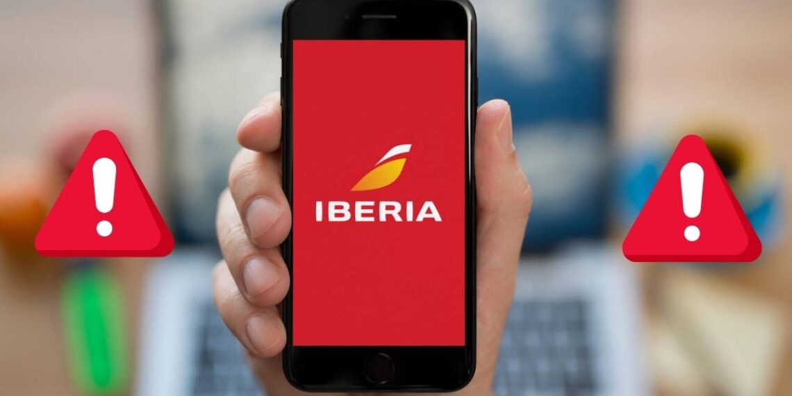 mano sosteniendo un teléfono celular